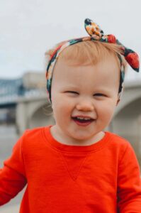 Smiling baby outdoors